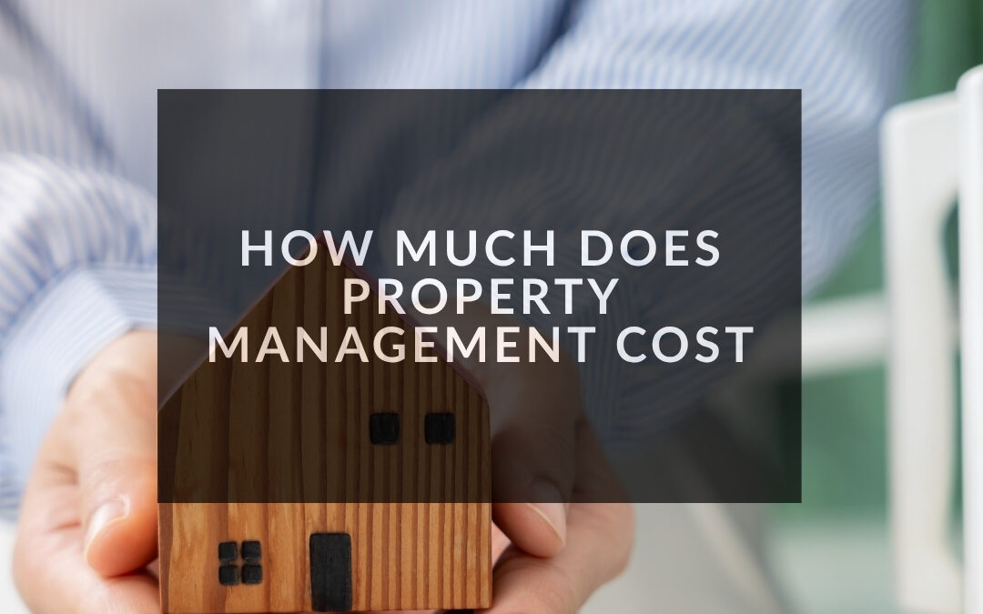 how much does property management cost illustrated by a person holding a small wooden house in their hands